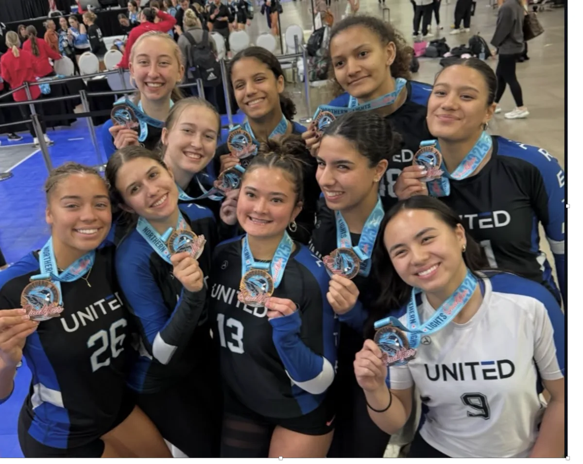 United OC club team celebrating with medals at the Northern Lights Qualifier