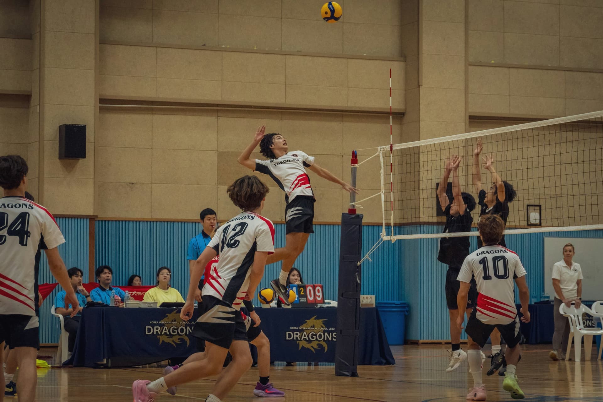 OCVA athletes competing on the volleyball court