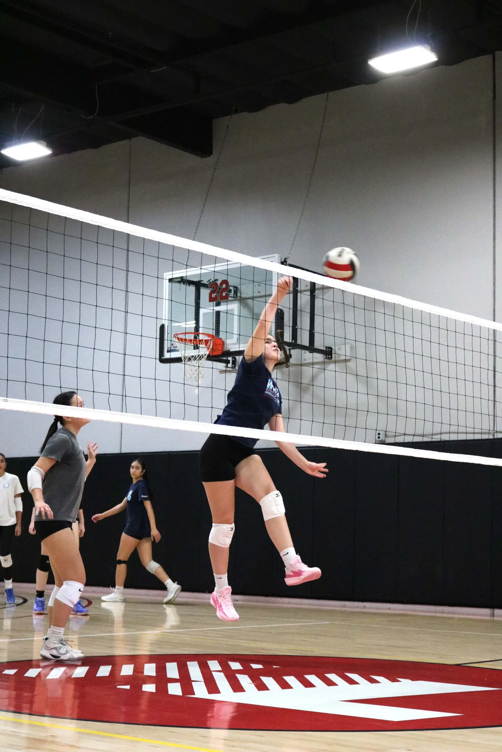 Orange County youth volleyball summer camp athletes in training session