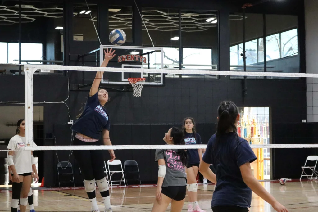 OCVA youth volleyball athletes training indoors in Irvine, Orange County