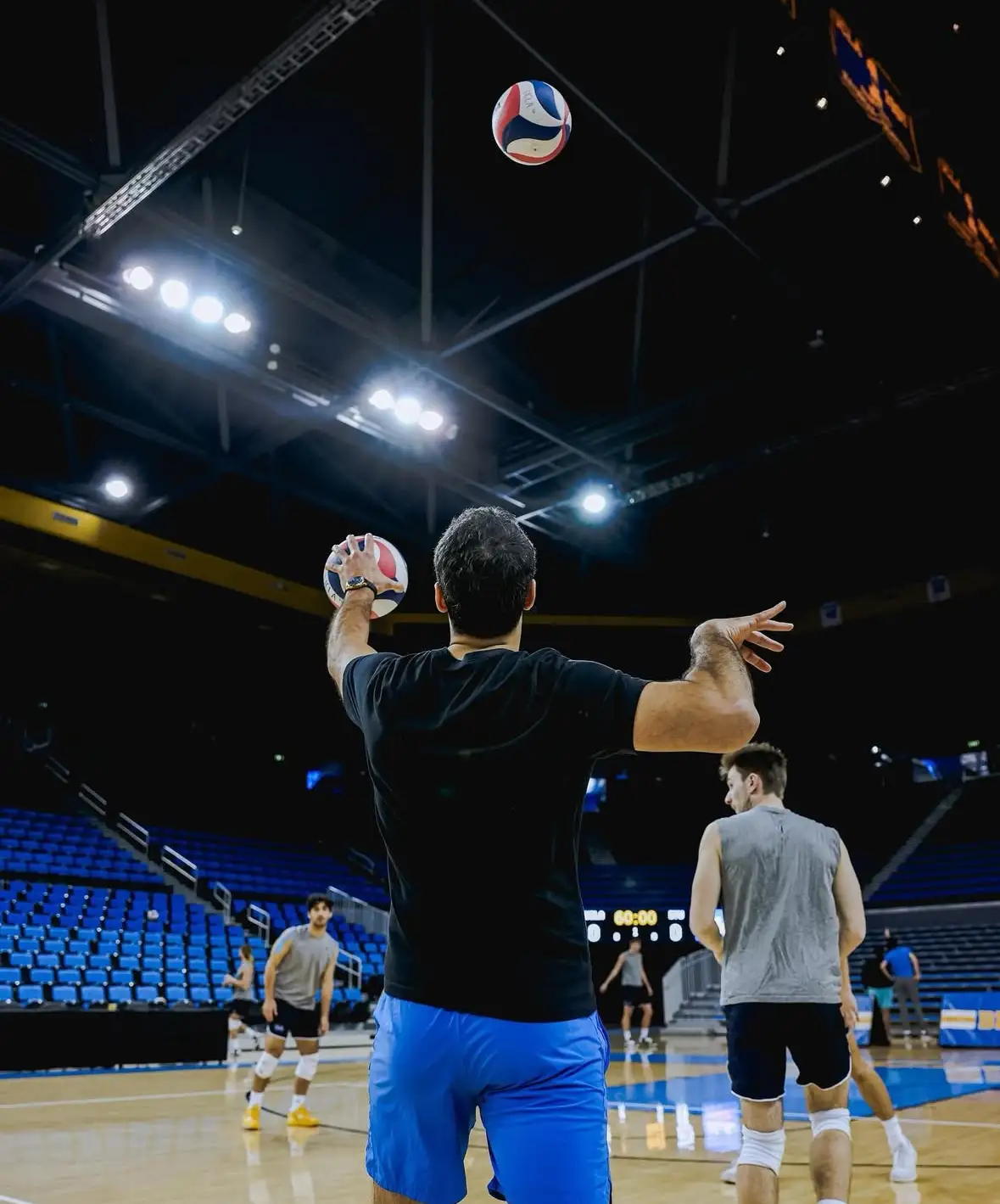 Youth athletes in structured volleyball team drill at OCVA camp